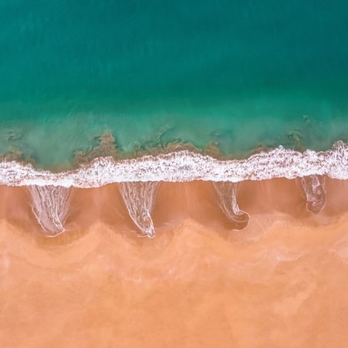 Aerial view of surfers near Hikkaduwa beach. Hikkaduwa, Sri Lanka.